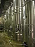 Into the stainless steel vats