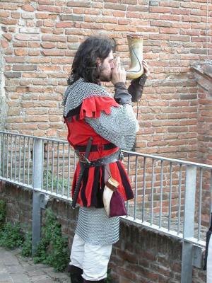 middle-age soldier at castello S. Zeno, His iron vest  weighs 15 KG.