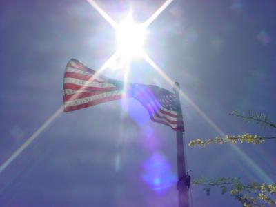beautiful red white and blue American flag & sun burst