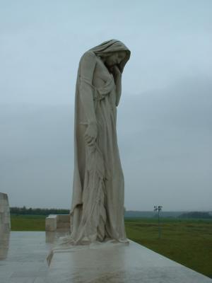 The figure represents Canada - a young nation mourning her dead.