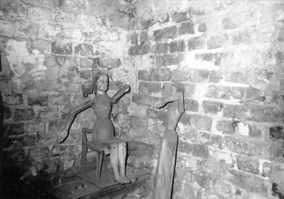 wooden figures in shrine