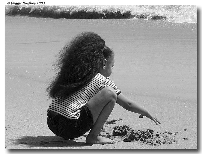 playing in the sand by Peggy