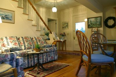 The dining/sitting area near the front entrance of the Anchor Watch Bed and Breakfast in Boothbay Harbor, Maine.
