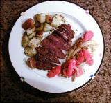 Grilled flank steak with herbed potatoes and carrot - fennel saute.