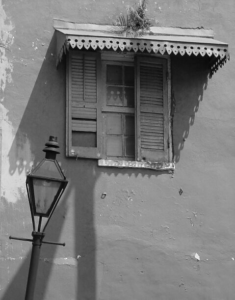WeatheredLampostWindowCloseupBW.jpg