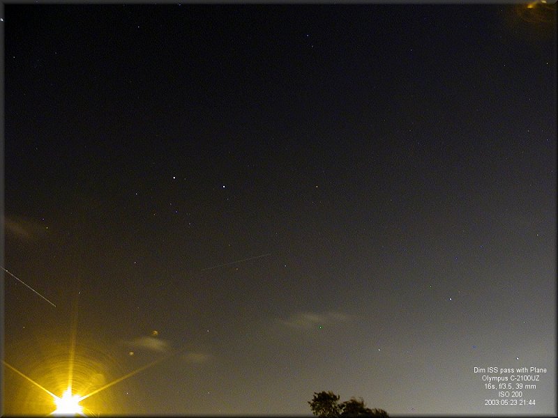 2144 Dim ISS with passing plane