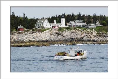 Lobster boat near Pemaquid Light (Maine Lighthouse)