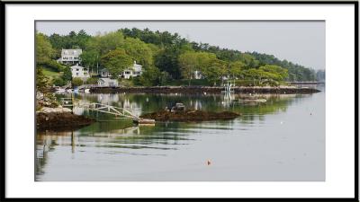 Small communities nestle by quiet harbors. (ocean Maine)