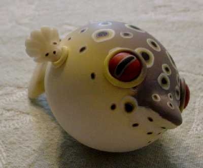 puffer fish rattle.  He's made over a chicken egg!