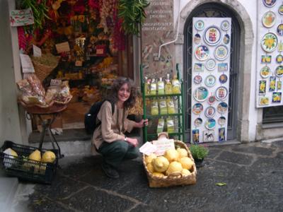 Judy at store. Giant lemons selling for 16 euros. Lemons grown on  terraces on cliffs all along Amalfi Coast since the 15th c.