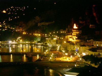 Amalfi at night from our patio. Amalfi was  a major maritime power, rivaling Genoa and Venice, from the 9th to 11th centuries.