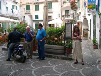 Judy at Piazza Umberto I. Atrani was backup defense for Amalfi & place for Amalfi aristocrats to live during the 10th cent.