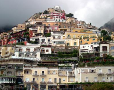 View of Positano from the beach. Beautiful, Moorish-style town. Houses on Mount Commune.