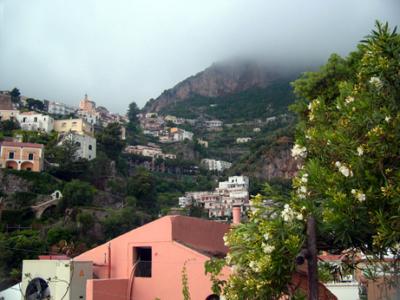 View of Positano and surrounding mountains. Positano was a Roman colony - then part of the Amalfi Republic (9th - 10th cent.).
