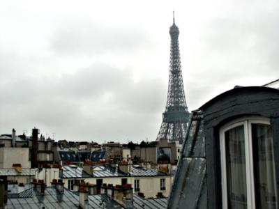 The Eiffel Tower from our hotel room. The Tower is 1,000 feet tall, covers 2.5 acres and was never meant to be permanent.