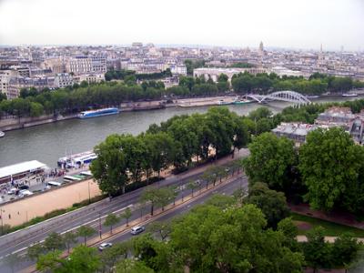 The Seine River and Paris as seen from the Eiffel Tower.