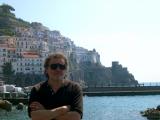 Richard waiting on a pier in Amalfi for the boat to the Emerald Grotto. Our hotel is seen at the top of hill in the background.