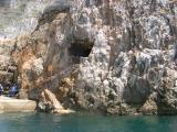 Entrance to Emerald Grotto: Discovered by fishermen in 1932. They entered via the steps. Public entrance via dock on the left.