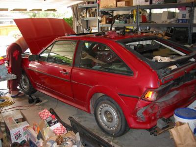 pulling good parts out of our wrecked Scirocco (Ruby)