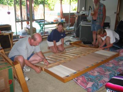 everyone helps take futon couch apart
