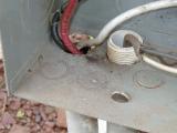 well pump wires shorting against breaker box casing