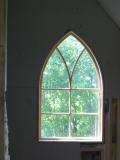 The gothic window in the stairwell