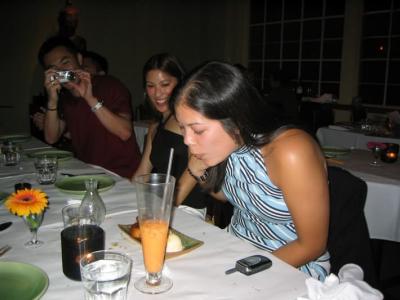 lisa blowing out her candle