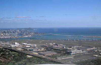 54-Honolulu Intl, Kamoku'akulikuli (Sand Island) behind