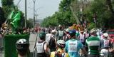 The participants cover the boulevard Saint Joseph from curb to curb as far as the eye can see as they steadily advance towards the chutes....The character in bright green is The Lawn, pedaling away at top speed from the lawnmower that is nipping at his heels!