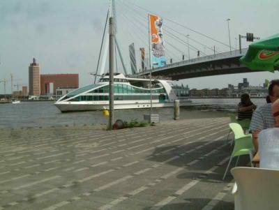 Spido harbour cruise ship passing Erasmus bridge