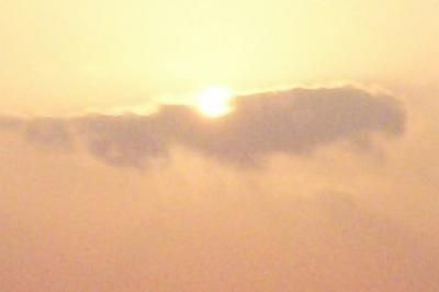 I took a photo of this sunrise just after leaving our house and then enlarged/cropped it to get just the sun climbing above this particular cloud mass. To me, it looks like a Bald Eagle in flight, with the sun being it's head and the cloud being its body/wings spread out.