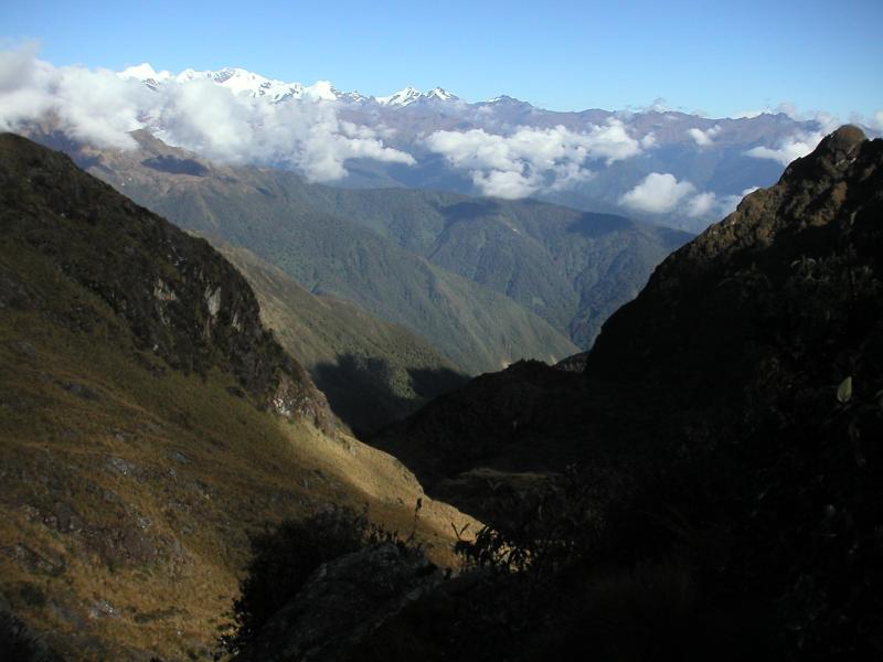 Snow capped mountains and deep green valleys