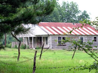 Barbed wire fence out front