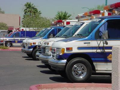 a row of ambulances waiting to save lives