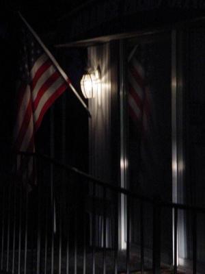 American flag and American flag reflection at paradise palms at 0447 hours