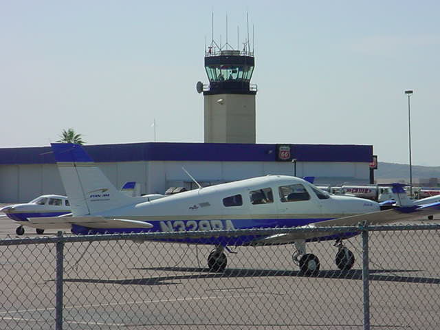 the tower and an airplane at Deer Valley airport