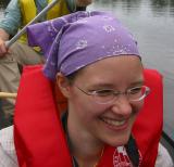 Janet in Canadian dress in a canoe on the Nyong River south of Mbalmayo