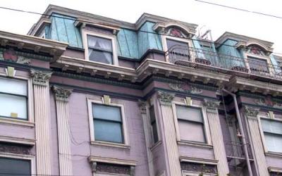 Haight-and-Broderick-pink-apt-bldg-verdigris-mansard-roof-det.jpg