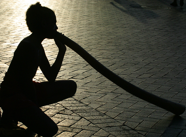 Silhouette of didgeridoo player