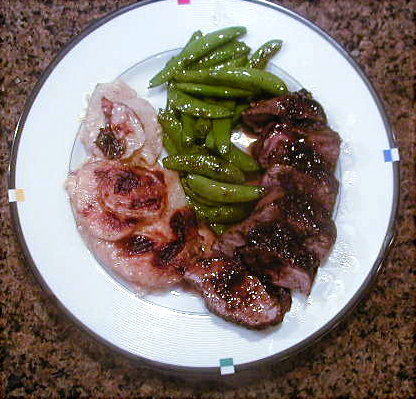 Maple glazed pork, au gratin potatoes and sugar snap peas.