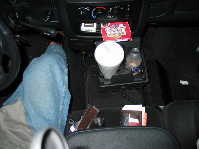 What have we got here..let's see....some cigs, dog snacks, a 32oz daiquiri and a Colt 45. Ready for the road!