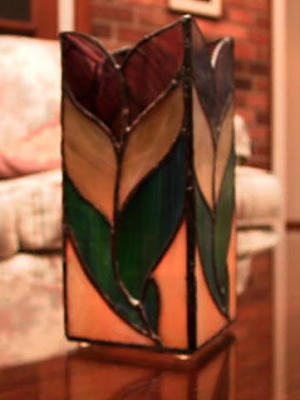u3/filer/medium/549508.Flowercandleholderslidecopy.jpg