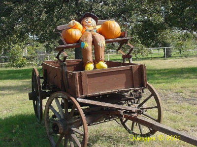 wagon and scarecrow