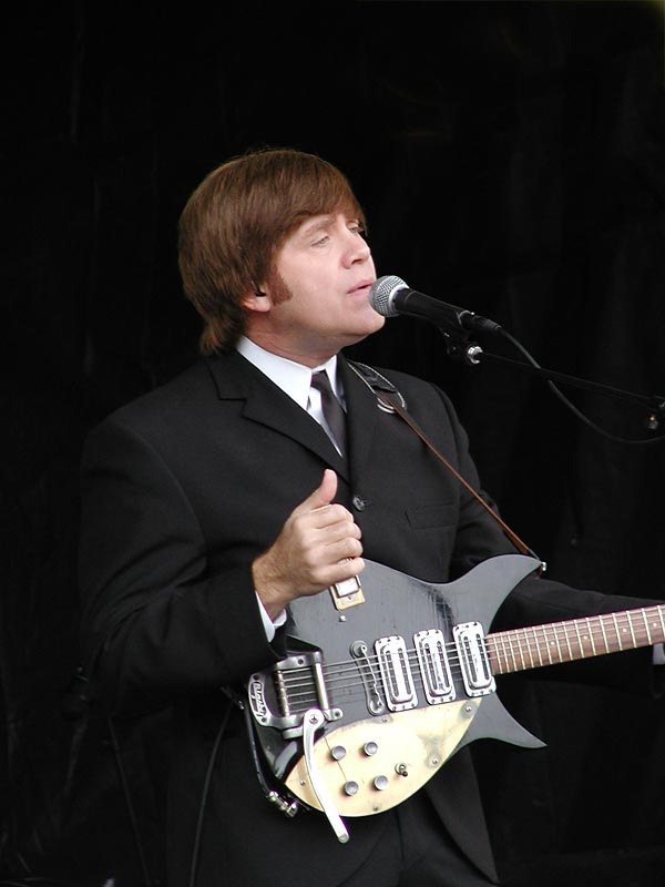 Mark Benson (John) plays an authentically styled 1958 Rickenbacker Hamburg 325 Capri guitar which he handmade.