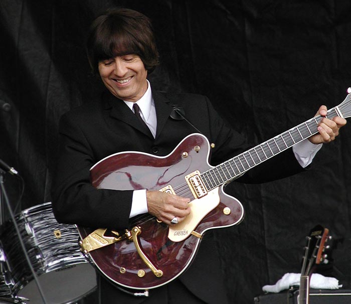 Jimmy Pou (as George Harrison)