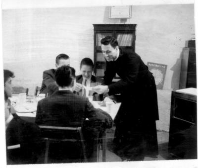 Fr. LeBlanc with  Billy Dugan, Richard Radzik hidden,to Billy's right, Rodney Early, back to camera, Danny Ingellis, far left.