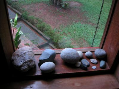 beach stones on the window sill