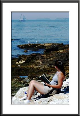 On Ocean Point, people relax as the windjammers move into place for... (reading, Maine, schooner, ocean)