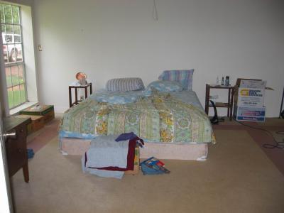 from kitchen/dining looking into master bedroom