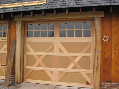 Gus had the garage doors trimmed out in beefy wood